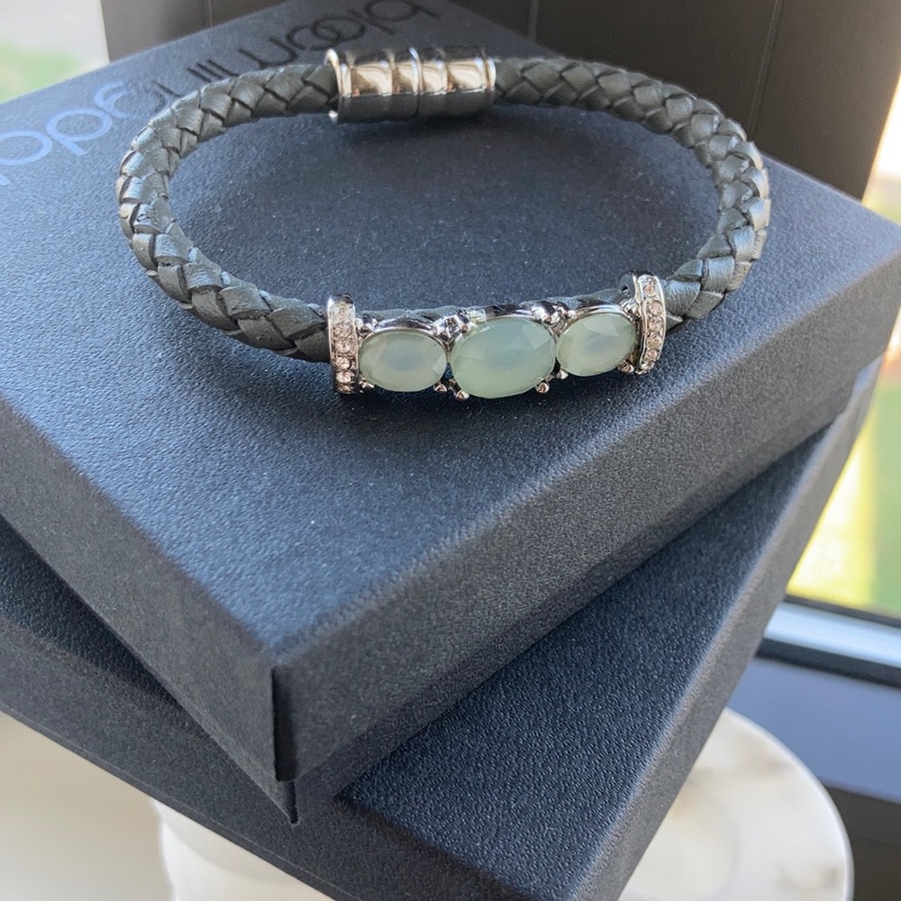 Gray Leather bracelet with custom gems and faux diamonds.